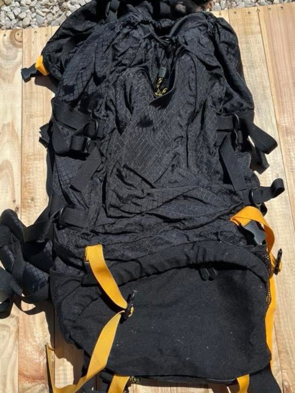 The North Face Black Backpack with Yellow Accents